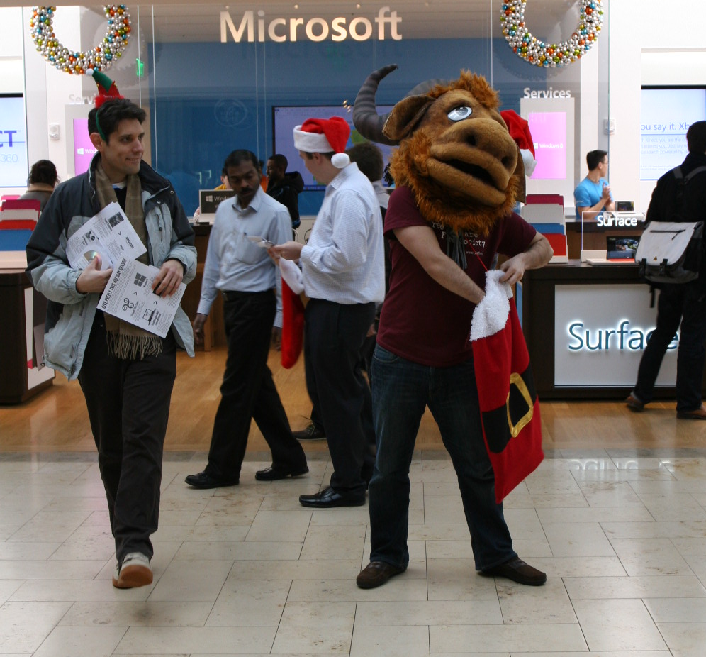 The gnu and friends handed out materials to passersby.