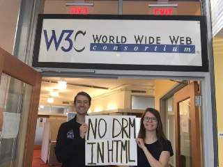 Two activists at the Cambridge W3C office.