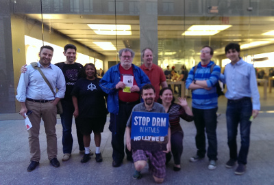 Activists at an Apple store on the 2015 Day Against DRM.