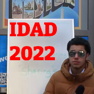 Person with sunglasses on with text that says IDAD 2022