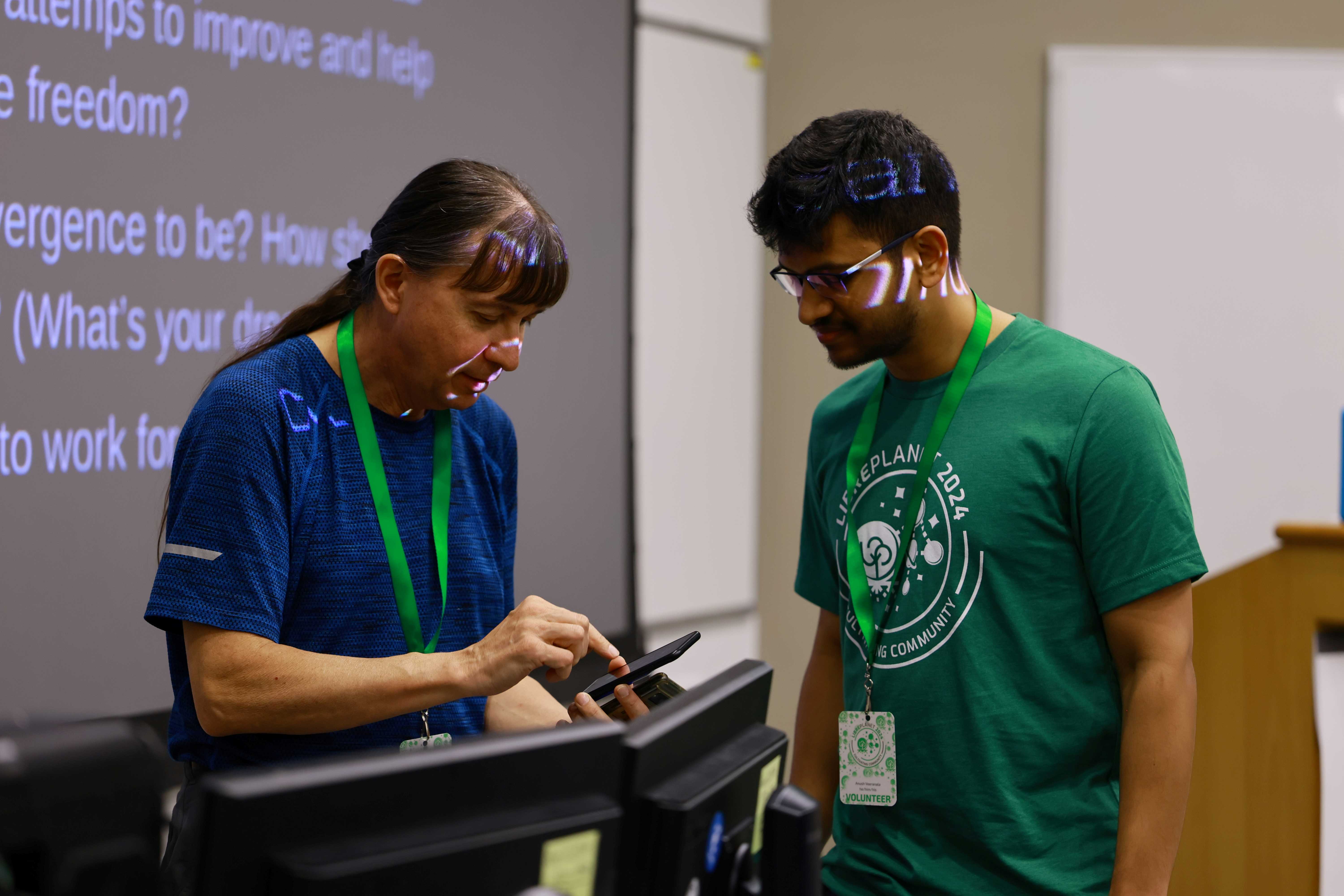 Photo of Anush Veeranala and Bob Proulx at LibrePlanet 2024.