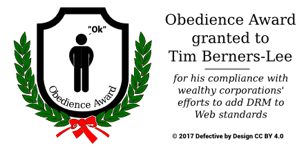 A plaque, surrounded by laurels, featuring the words 'Obedience Award' and a stick figure saying 'Ok'.