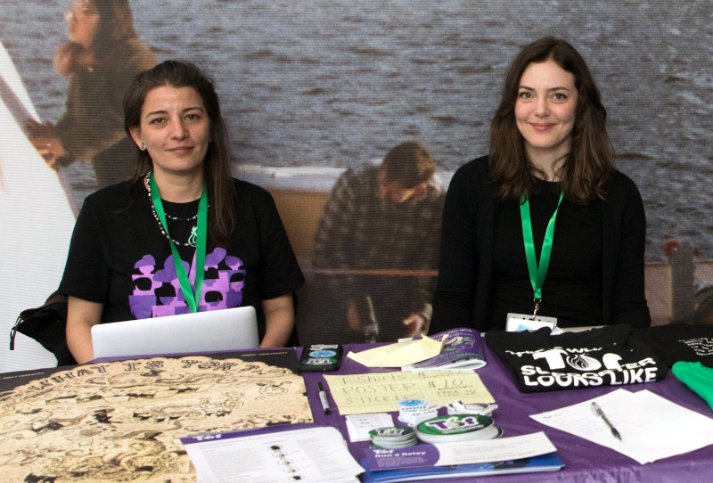 Isabela Bagueros poses with a colleague at the Tor Project table at LibrePlanet 2019.